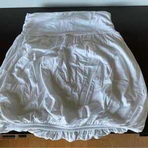 White ruffled skirt